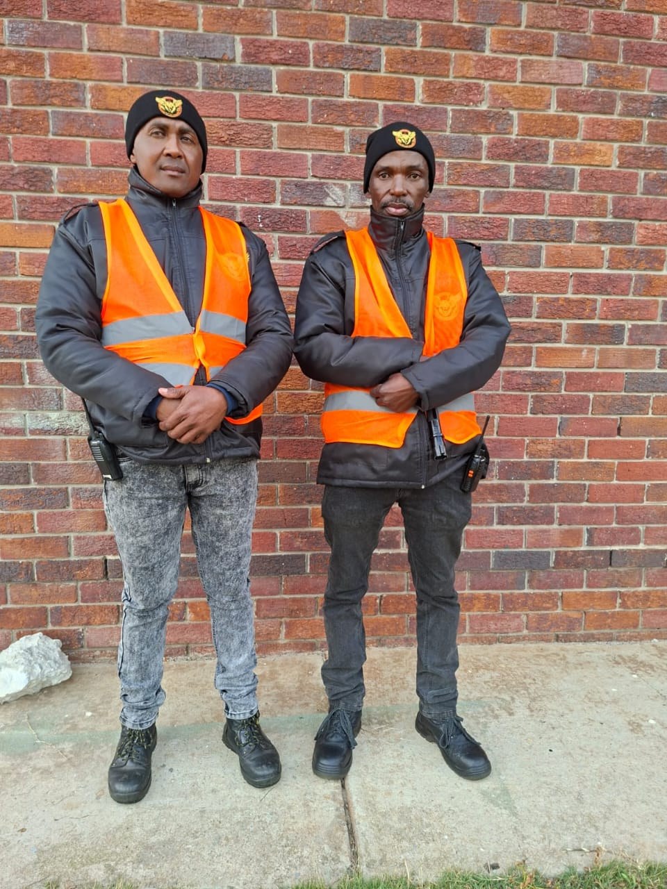 Bravo Delta guards wearing high-visibility vests for event security
